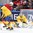 MOSCOW, RUSSIA - MAY 14: Sweden's Jacob Markstrom #25 makes the save on this play while teammate Adam Larsson #5 battles with Norway's Andreas Martinsen #24 during preliminary round action at the 2016 IIHF Ice Hockey World Championship. (Photo by Andre Ringuette/HHOF-IIHF Images)

